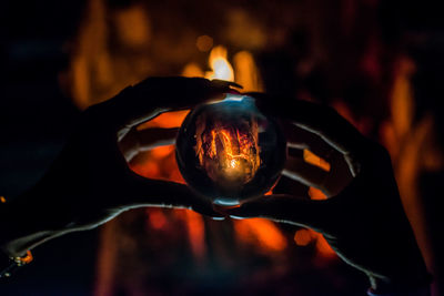 Close-up of human hand holding ball