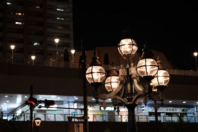 Low angle view of illuminated street light