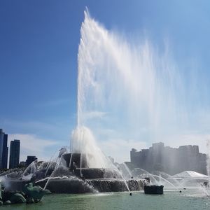 View of fountain against cloudy sky