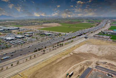 High angle view of highway against sky in city