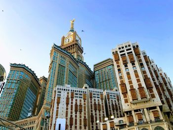 Low angle view of mecca royal clock tower and component towers