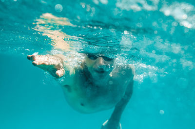 Man swimming in sea