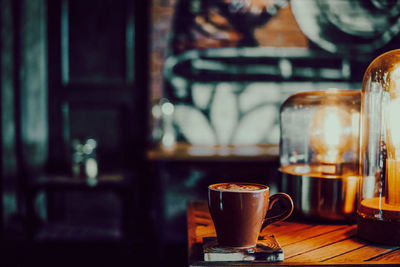 Close-up of coffee served on table