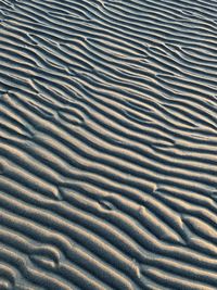 High angle view of sand dunes on beach