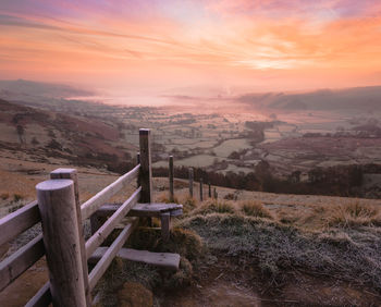 Scenic view of landscape against sky during sunset