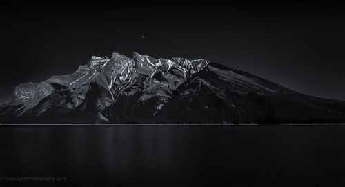 Scenic view of mountains at night