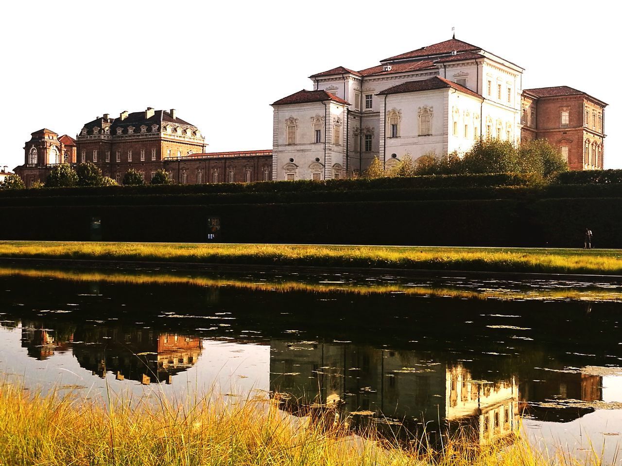 REFLECTION OF BUILDINGS IN WATER