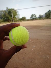 Human hand holding ball