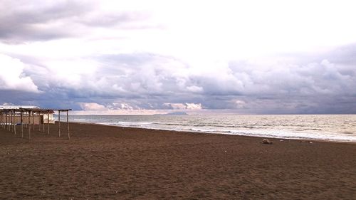 Scenic view of beach against sky