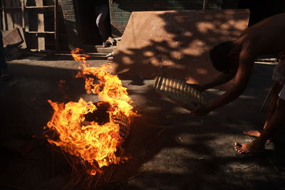 Man preparing food on barbecue grill