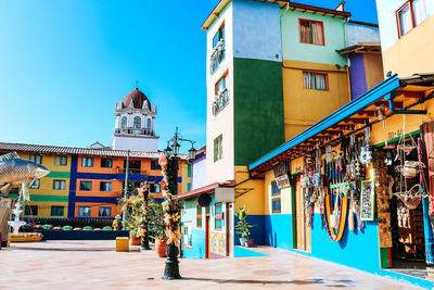 Exterior of buildings in city against sky