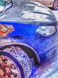 Close-up of blue car
