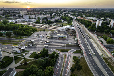 Warsaw, city centre panorama at sunset, business centre 2022. sunset reflected in buildings.