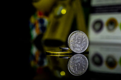 Close-up of 5 rupee coin