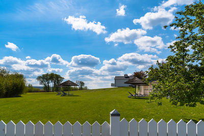 Scenic view of landscape against blue sky