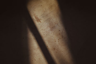 Close-up of shadow on table