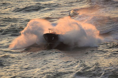 Pilot vessel through pounding waves