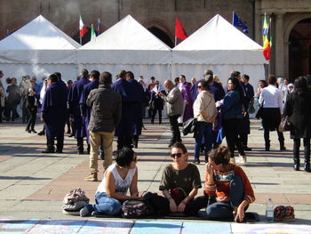 Group of people on street in city