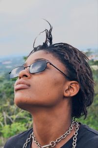 Close-up of young woman wearing sunglasses