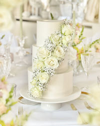 Close-up of wedding rings on table