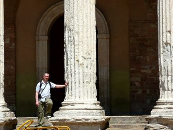 Full length of man standing outside temple