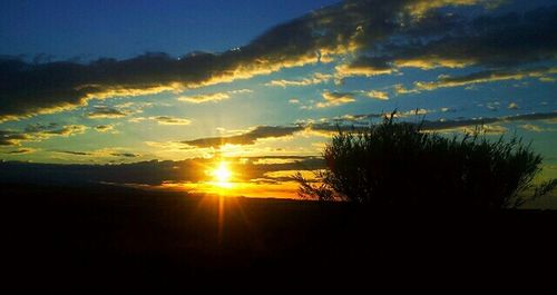 Scenic view of sunset over landscape