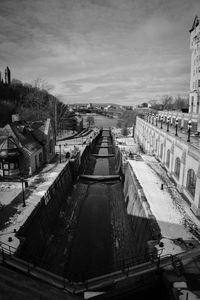 High angle view of buildings and houses against sky