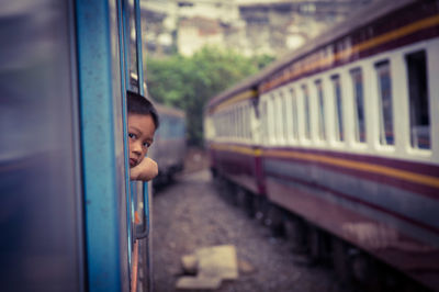 Full length of girl in train
