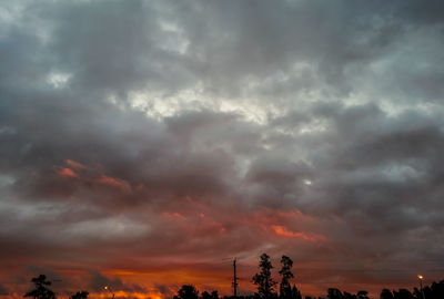 Scenic view of dramatic sky during sunset