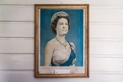 Statue against blue wall