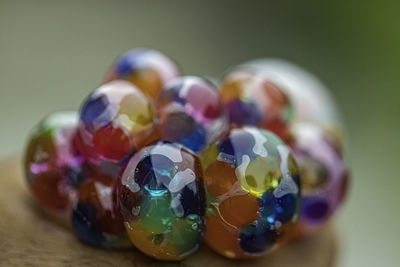 Close-up of multi colored balls on table