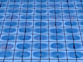 Full frame shot of swimming pool against blue sky