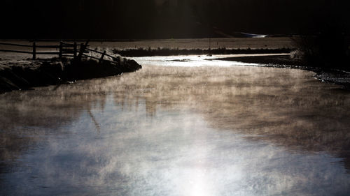 Reflection of sky in puddle