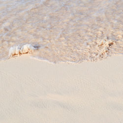 High angle view of sand on beach