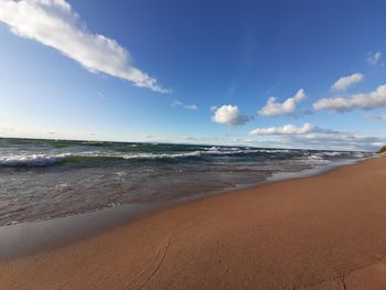 Scenic view of beach against sky