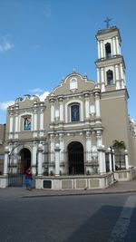 Low angle view of bell tower against sky