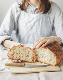 Midsection of woman having food