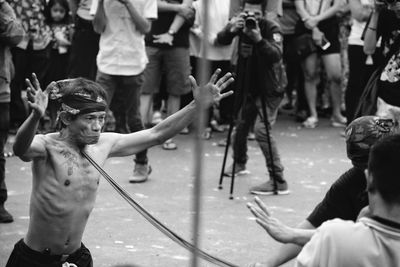 People looking at street performers