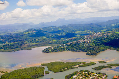 Aerial view of landscape and mountains against sky