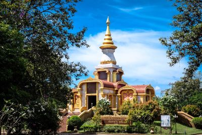 View of buildings against cloudy sky