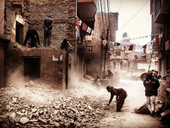 People working in city