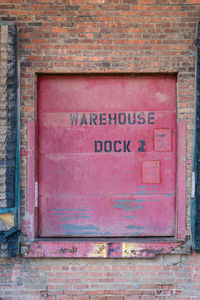 Close-up of pink brick wall