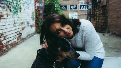 Portrait of woman with dog