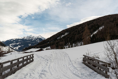 Snow covered mountains against sky