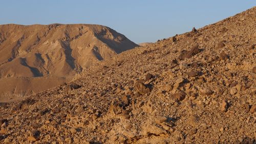 Scenic view of desert against clear sky