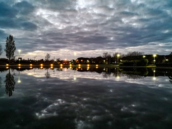 Reflection of trees in water at night