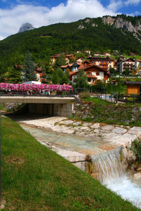 View of canal passing through mountains