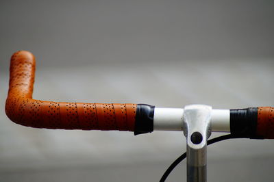 Close-up of bicycle on wet metal