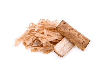 High angle view of bread against white background