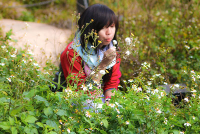 Girl standing in grass